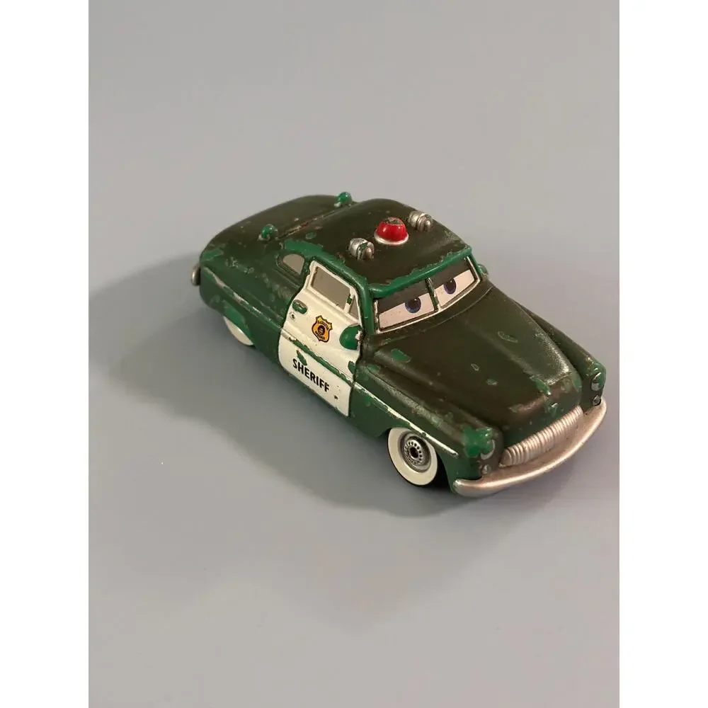 Disney Pixar Cars Christmas Holiday Spirit Sheriff Diecast 1:55 Green